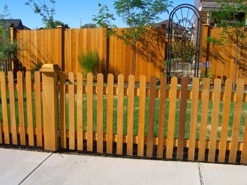Cedar fencing with ornamental gate