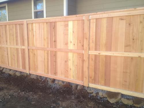 Cedar fencing around home