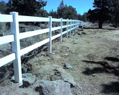 Vinyl fence around property