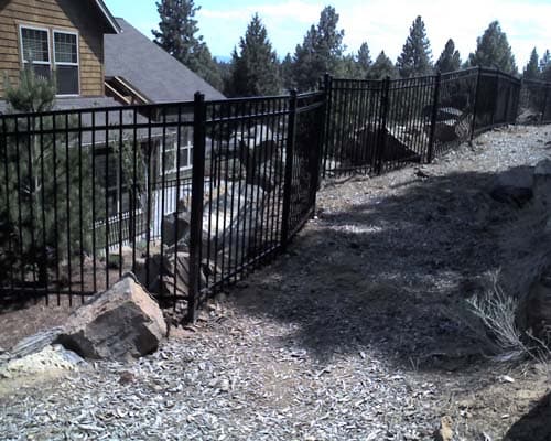 Metal fencing around property